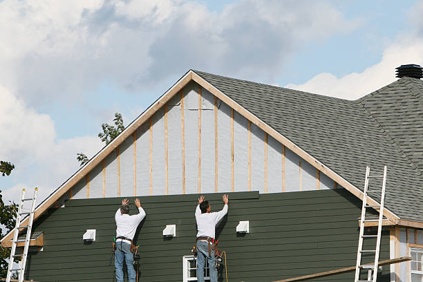 Professional Siding Repair technician working in Fairview, NY